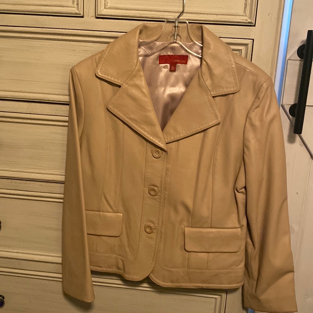 Cute Leather Jacket, short with stitching and tapered at waist. Never worn!